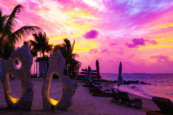 Sunset on magenta private island resort in Belize