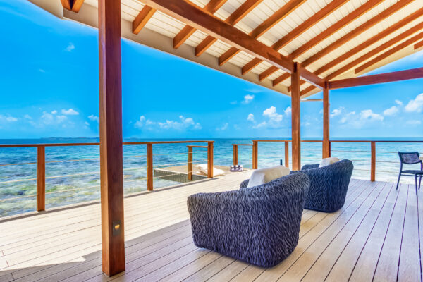 Magenta private island resort belize with Ocean view deck with stylish chairs